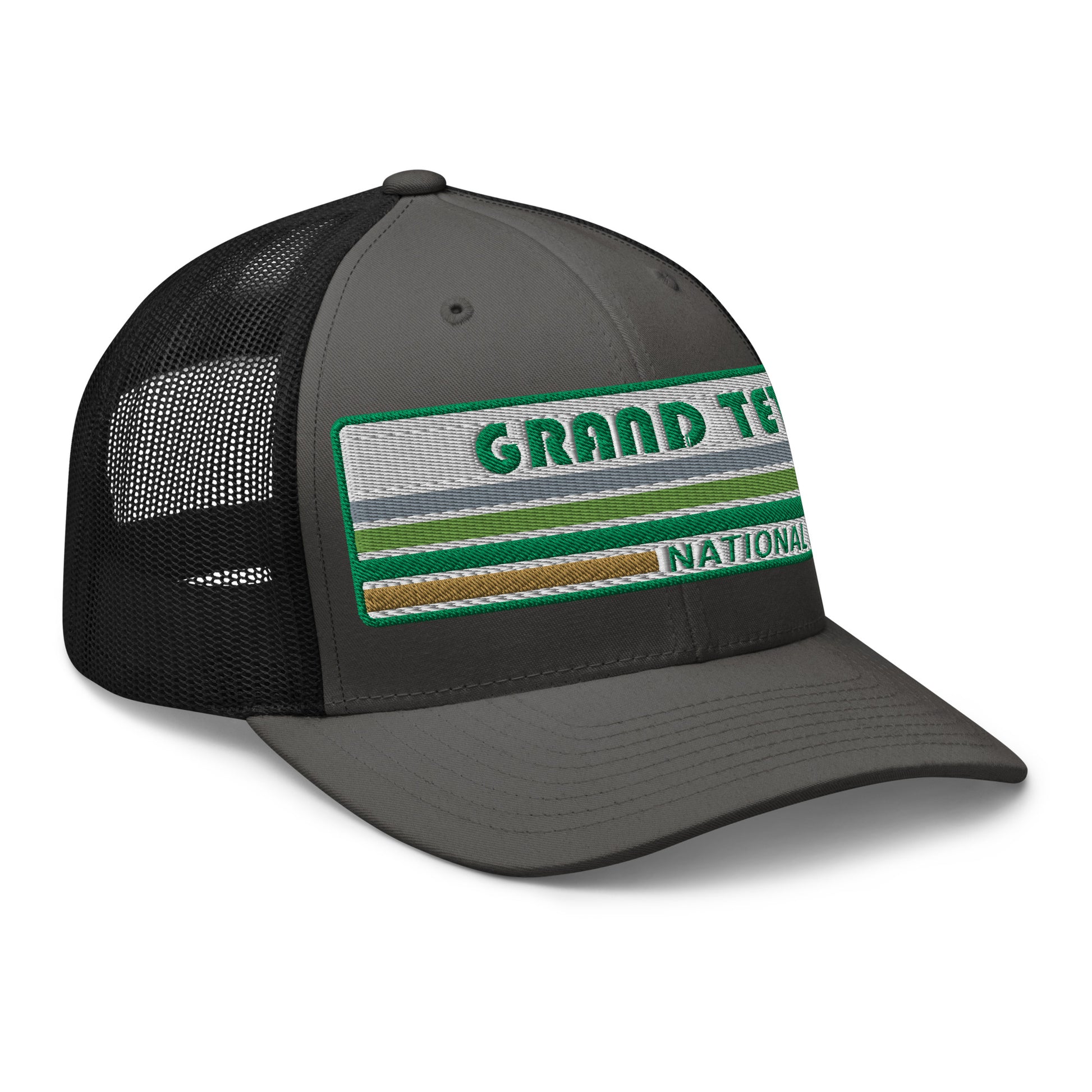 Grand Teton Hat with Retro 70's Style embroidered national park logo. Grand Teton National Park in Green on a charcoal/black Yupoong 6606 Trucker Hat right side view.