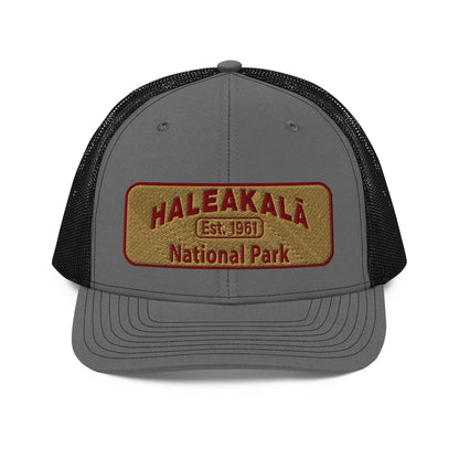 Haleakalā National Park Camo Hat - Gold and Red Embroidered Haleakalā National Park logo on front - Richardson 112 Trucker Hat - Front View  - Color:  Heather/Black